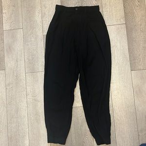 Cuffed black pants with pockets